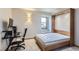 Bedroom with a stylish murphy bed pulled down, cozy window nook at 5275 Holmes Pl, Boulder, CO 80303