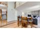 Open-concept dining area with wood floors and a view of the staircase at 5275 Holmes Pl, Boulder, CO 80303