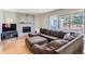 Comfortable living room with a large sectional couch and access to the patio at 5275 Holmes Pl, Boulder, CO 80303