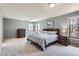 Serene bedroom with plush carpet, natural light, and coordinated furniture at 5275 Holmes Pl, Boulder, CO 80303