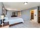 Spacious bedroom featuring soft carpet, walk-in closet, and neutral walls at 5275 Holmes Pl, Boulder, CO 80303