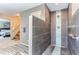 Contemporary tiled shower with blue glass accents and modern fixtures at 5275 Holmes Pl, Boulder, CO 80303