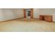 Spacious bonus room with a desk nook and open access to the staircase, ready for customization at 4822 Bandera Pl, Parker, CO 80134