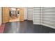 Organized storage room with ample shelving, offering plenty of space for storage, next to the staircase at 4822 Bandera Pl, Parker, CO 80134