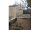 Backyard area features access to garage and concrete benches for outdoor seating and enjoyment at 5640 E 67Th Pl, Commerce City, CO 80022