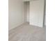 Bedroom with sliding closet, neutral walls and carpet at 5640 E 67Th Pl, Commerce City, CO 80022