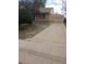 Charming single-Gathering home with a well-maintained front yard and a detached garage at the end of long driveway at 5640 E 67Th Pl, Commerce City, CO 80022