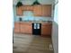 Updated kitchen featuring ample cabinets and laminate countertops at 5640 E 67Th Pl, Commerce City, CO 80022