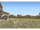 Expansive backyard with patio area, perfect for outdoor gatherings and leisure activities at 785 Iris St, Brighton, CO 80601
