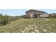 Scenic back yard featuring a spacious lawn, perfect for outdoor living and activities at 785 Iris St, Brighton, CO 80601