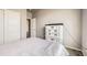 Bright bedroom featuring carpet floors, a large closet, and neutral paint at 785 Iris St, Brighton, CO 80601
