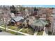 Bird's eye view of the property showcasing the surrounding neighborhood and manicured lawns at 1582 Fairfax St, Denver, CO 80220