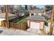 Aerial view of fenced backyard with a garage at 1582 Fairfax St, Denver, CO 80220