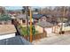Well-maintained backyard featuring a detached garage, green lawn, and privacy fence at 1582 Fairfax St, Denver, CO 80220