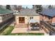 Backyard aerial view featuring a newly constructed deck and outdoor seating area at 1582 Fairfax St, Denver, CO 80220