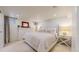 Comfortable bedroom featuring neutral tones, recessed lighting, and a decorative fireplace at 1582 Fairfax St, Denver, CO 80220