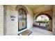 Cozy covered front porch featuring a hanging swing seat for relaxation and enjoyment at 1582 Fairfax St, Denver, CO 80220
