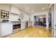 Bright kitchen featuring modern appliances, white cabinets, and hardwood flooring for a fresh look at 1582 Fairfax St, Denver, CO 80220
