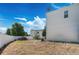 Spacious backyard with white fence and stone landscaping at 4528 Andes St, Denver, CO 80249