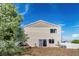 Spacious backyard with white fence and stone landscaping at 4528 Andes St, Denver, CO 80249
