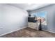 Bedroom features a window, dresser, and tv at 4528 Andes St, Denver, CO 80249