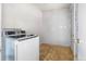 Laundry room with modern washer and dryer appliances at 4528 Andes St, Denver, CO 80249