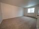 Spacious carpeted bedroom with natural lighting at 17973 E Iowa Dr, Aurora, CO 80017