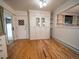 Dining area featuring hardwood floors, built-in storage, and sliding door at 17973 E Iowa Dr, Aurora, CO 80017