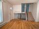 Inviting living room offers hardwood floors and a staircase at 17973 E Iowa Dr, Aurora, CO 80017