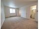 Large bedroom with closet and bathroom access at 17973 E Iowa Dr, Aurora, CO 80017