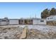 Exterior shot of backyard showing covered patio at 621 Campo St, Denver, CO 80221