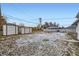 Spacious backyard featuring a shed and partial fencing at 621 Campo St, Denver, CO 80221