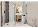 Bathroom showcasing updated shower, vanity and marble floors at 621 Campo St, Denver, CO 80221