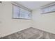 Bedroom with neutral carpet and lots of light at 621 Campo St, Denver, CO 80221