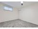 Bedroom with neutral carpet and white walls at 621 Campo St, Denver, CO 80221