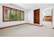 Finished basement with many windows and custom shelving at 96 Falcon Hills Dr, Highlands Ranch, CO 80126
