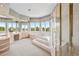 Expansive primary bathroom boasts a large soaking tub, a shower, and dual sinks with scenic views at 96 Falcon Hills Dr, Highlands Ranch, CO 80126