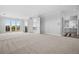 Spacious main bedroom boasts private balcony access and ensuite bathroom with dual vanities at 96 Falcon Hills Dr, Highlands Ranch, CO 80126