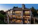 Beautiful home exterior boasting multiple balconies and floor-to-ceiling windows at 96 Falcon Hills Dr, Highlands Ranch, CO 80126