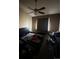 Bedroom with carpet flooring, ceiling fan and window at 5255 Memphis St # 121, Denver, CO 80239