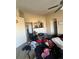 Open-concept living room with vaulted ceilings and a ceiling fan at 5255 Memphis St # 121, Denver, CO 80239