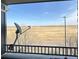 Balcony view overlooking an open space area on a sunny day with blue sky at 5255 Memphis St # 121, Denver, CO 80239