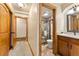 Bathroom with vanity and glass enclosed shower with tile surround at 107 Skiwatch Dr # 329, Breckenridge, CO 80424