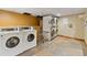 Well-equipped laundry room with modern washers and dryers at 107 Skiwatch Dr # 329, Breckenridge, CO 80424
