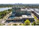 Modern high-rise building with glass facade, swimming pool, and city skyline views in an attractive location at 4200 W 17Th Ave # 611, Denver, CO 80204