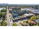Aerial view of a modern apartment complex featuring a swimming pool and landscaping at 4200 W 17Th Ave # 611, Denver, CO 80204