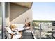 Cozy balcony with comfortable seating and stunning water views at 4200 W 17Th Ave # 611, Denver, CO 80204