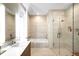 Modern bathroom with walk-in shower, soaking tub, and contemporary fixtures at 4200 W 17Th Ave # 611, Denver, CO 80204