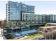 Modern apartment building with balconies overlooking an outdoor swimming pool at 4200 W 17Th Ave # 611, Denver, CO 80204