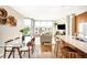 Bright living room featuring hardwood floors, large windows, and an open-concept design at 4200 W 17Th Ave # 611, Denver, CO 80204